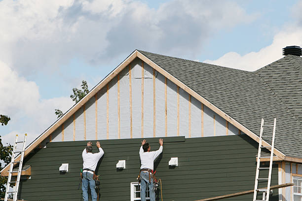 Professional Siding Replacement technician working in Aurora, IN